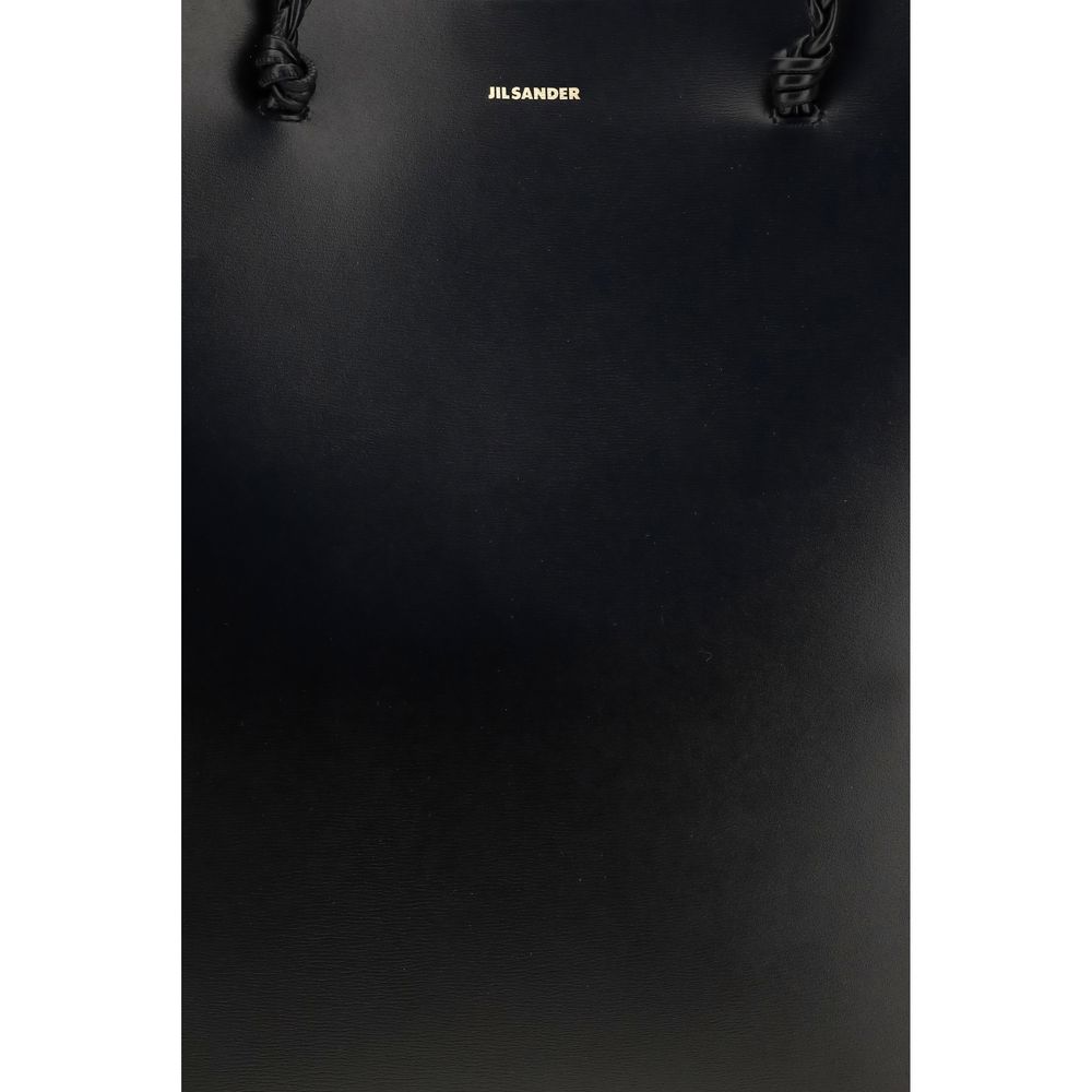 Shoulder Shopper Bag by Jil Sander for women in bos taurus calf leather black showcases a enviable silhouette, artfully detailed with a secure , organized , and versatile shoulder-strap for a enviable look.