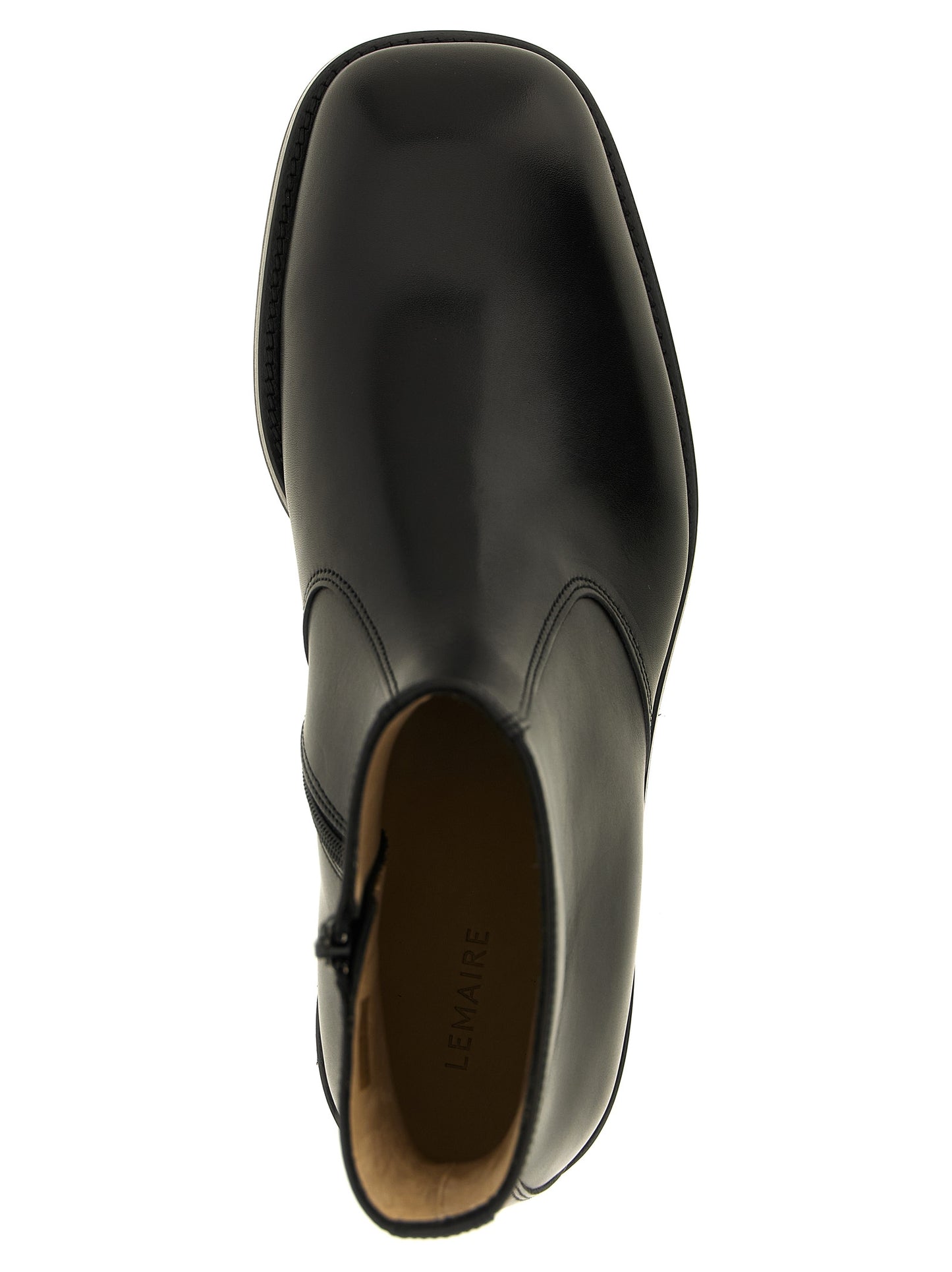 Ankle Boots by Lemaire for men in lamb leather black showcases a ergonomic silhouette from the Men's Lamb Leather Ankle Boots collection, featuring a ergonomic and a ergonomic square toe style.