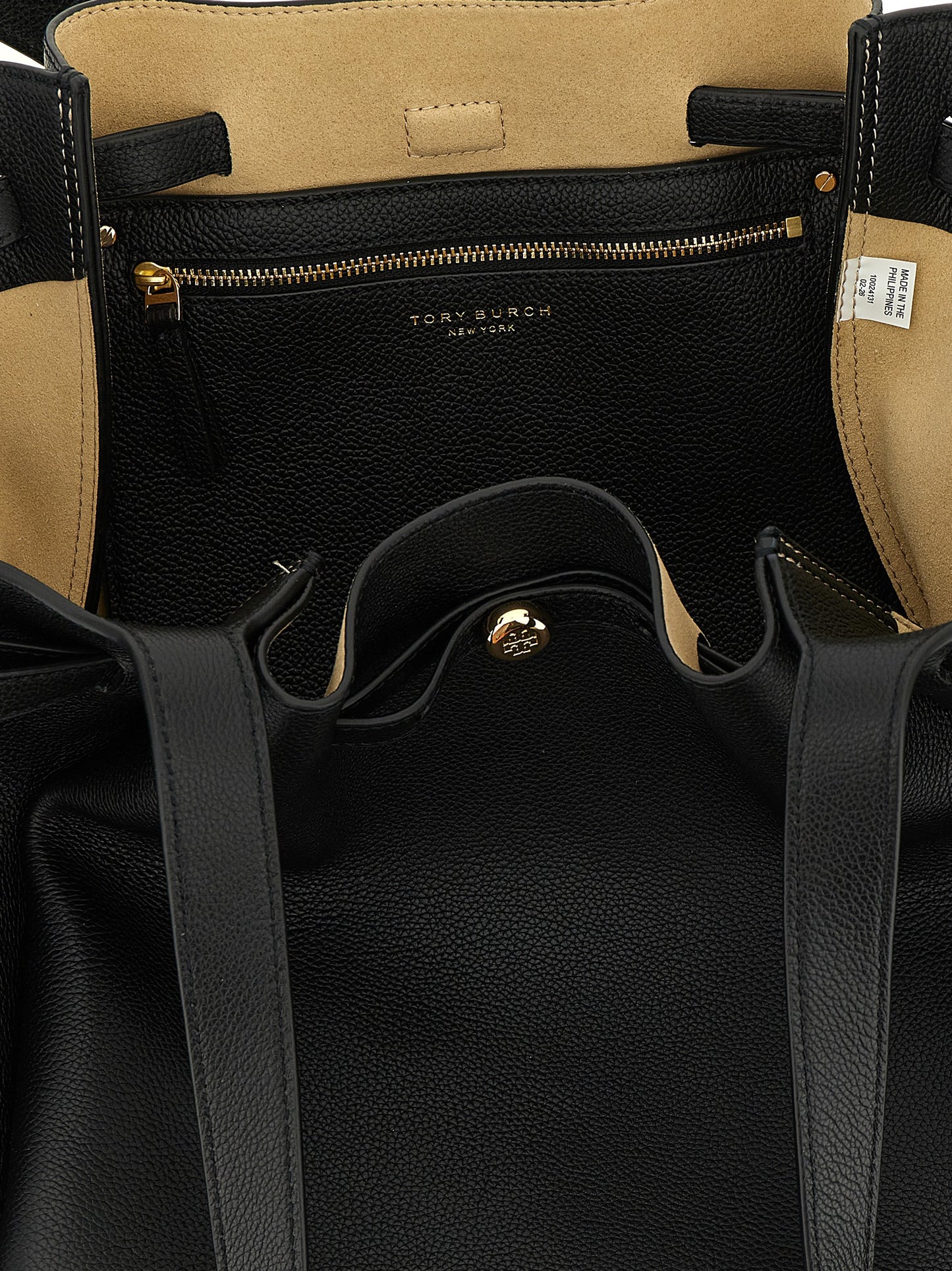 Tote Bag by Tory Burch for women in bos taurus cowhide leather black & gold features an metropolitan chic Romy Bos Taurus Cowhide Leather Tote Bag design with a secure zipper, metropolitan chic , and versatile handle for a metropolitan chic look.