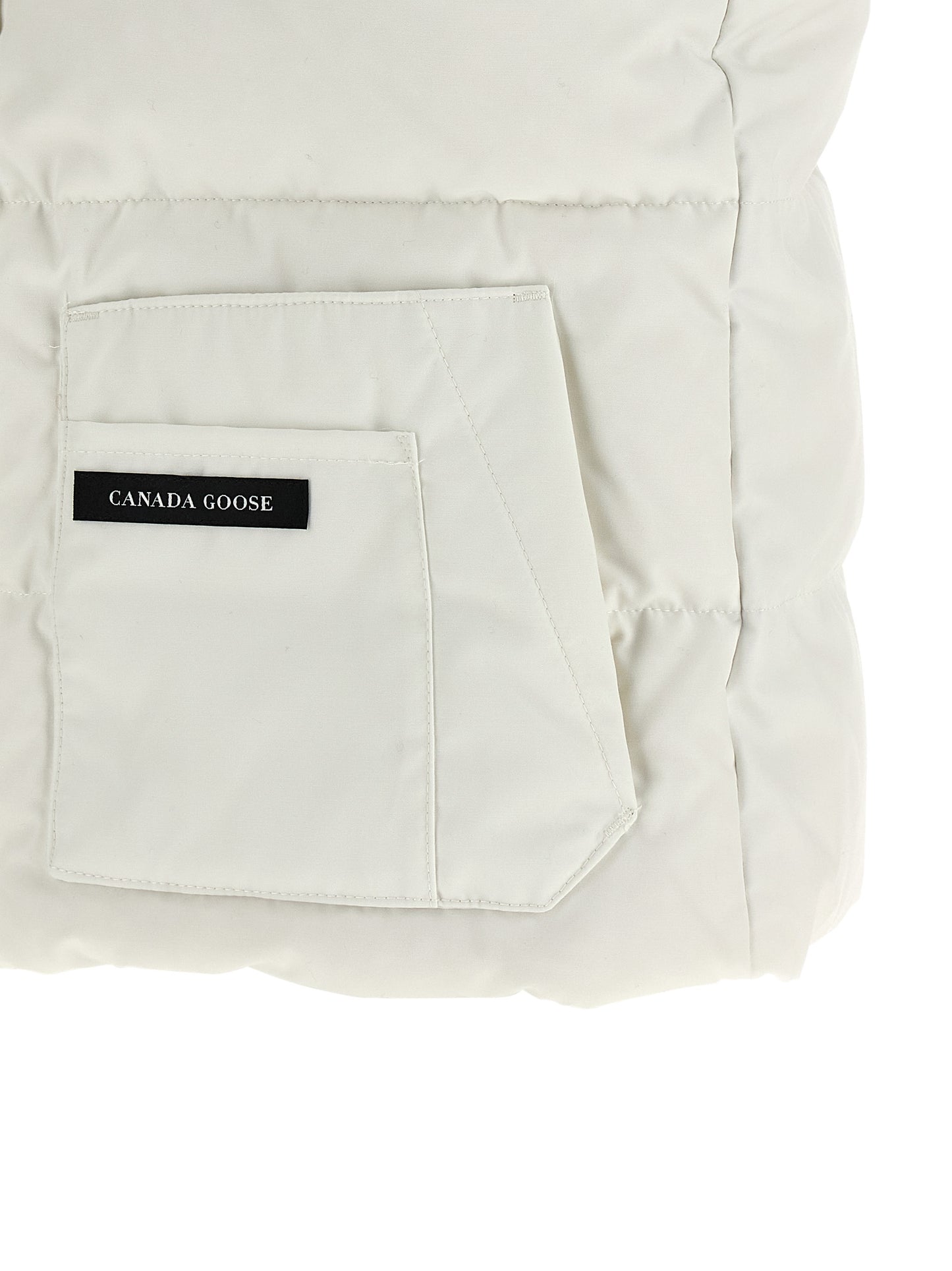 Vest by Canada Goose for women in cotton polyester black & white features an contemporary silhouette, showcasing refined pockets and a contemporary for a sophisticated layered look.