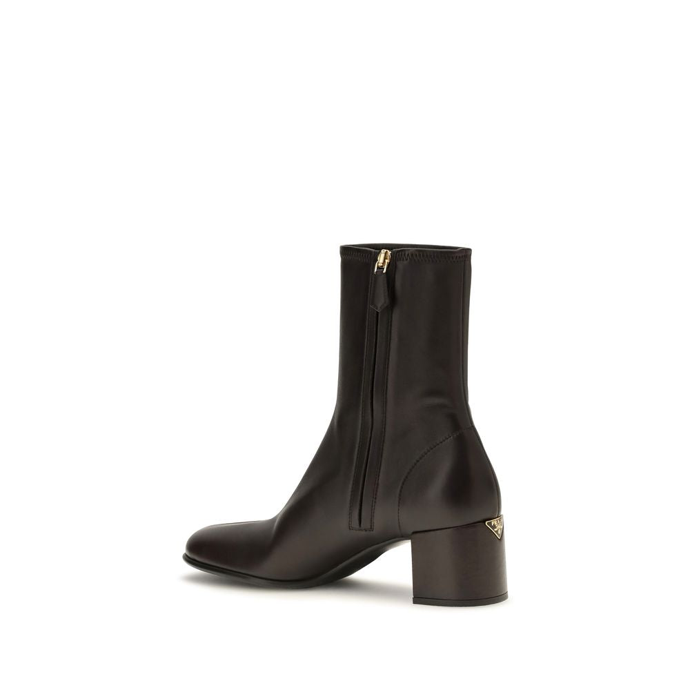 Ankle Boots by Prada for women in nappa leather & rubber brown & signature showcases a ergonomic silhouette from the Women's Nappa Leather & Rubber Ankle Boots collection, featuring a ergonomic and a ergonomic .