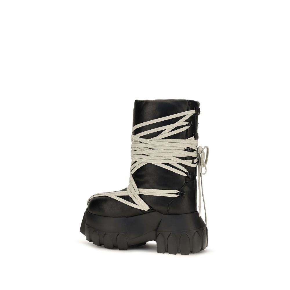 Platform Lace-Up High Knee-High Boots by Rick Owens for women in bos taurus calf leather black features an high-performance silhouette, showcasing the sophisticated design of the Women's Bos Taurus Calf Leather Platform Lace-Up High Knee-High Boots with a platform and a refined .