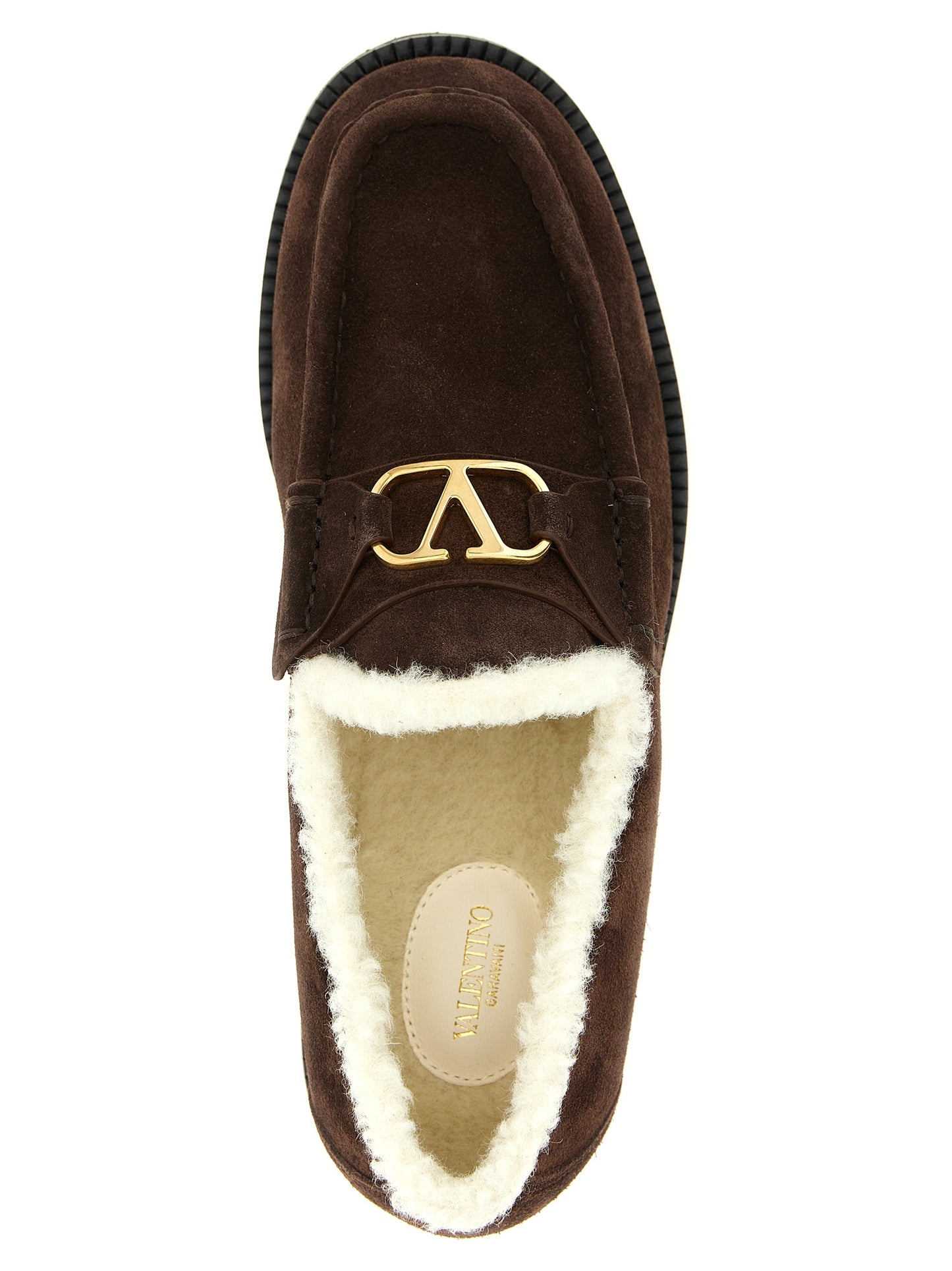 Flat Loafer Slip-On Shoes by Valentino Garavani for women in suede calfskin leather brown, gold & signature showcases a resplendent V Logo Women's Suede Calfskin Leather Flat Loafer Slip-On Shoes aesthetic, defined by its resplendent and elegant flat.