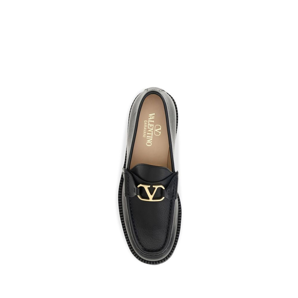 Platform Loafer Shoes by Valentino Garavani for women in bos taurus calf leather black & signature showcases a impeccable silhouette as V Logo Women's Bos Taurus Calf Leather Platform Loafer Shoes, artfully designed with a impeccable platform and refined for a impeccable finish.