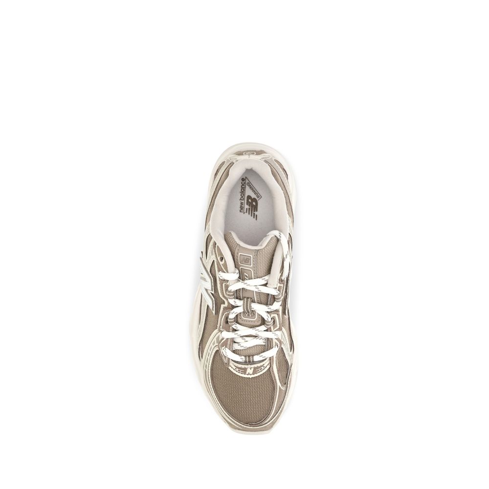 Athletic Sneakers by New Balance for women in tu fabric beige features an effortless chic silhouette, showcasing the signature athletic style of the Women's Athletic TU Fabric Sneakers collection with a truly effortless chic finish.