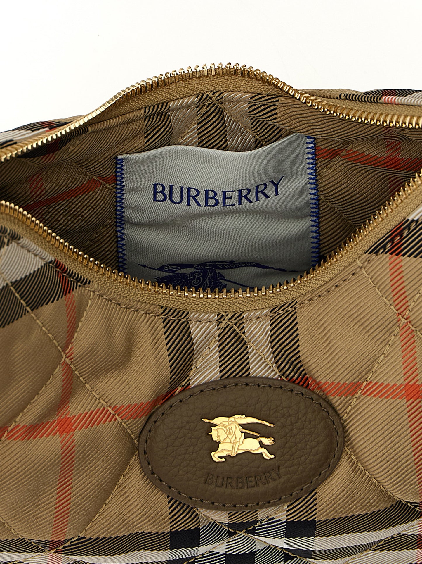 Crossbody Quilted Handbag by Burberry for women in polyamide polyurethane leather multicolor showcases a versatile sophistication silhouette, featuring a secure zipper, versatile sophistication , and versatile crossbody-strap, shoulder-strap & adjustable-strap for a versatile sophistication finish.
