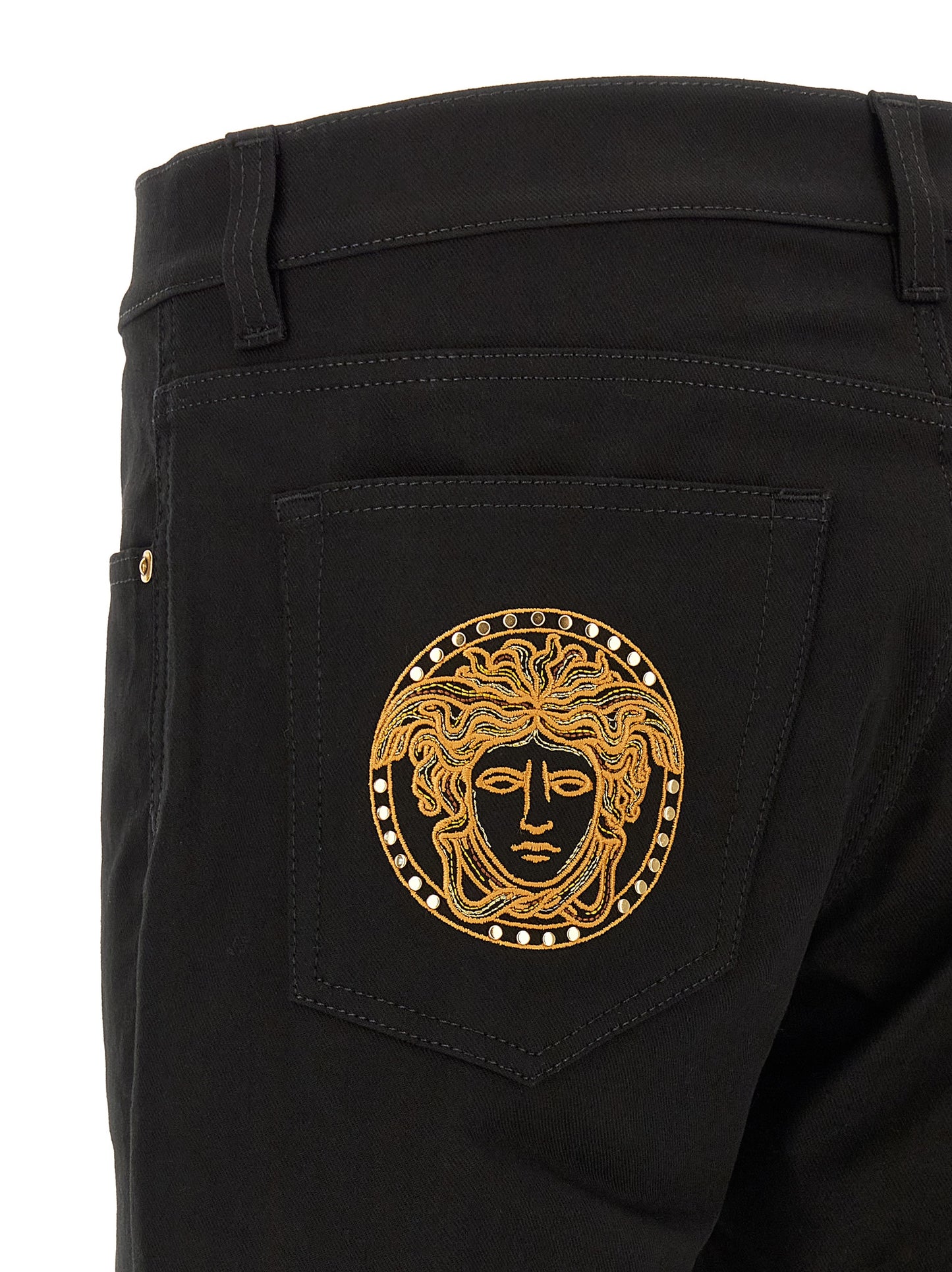 Jeans by Versace for men in stretch denim cotton black & gold features an sartorial straight-leg and long with a cut for a sartorial finish.