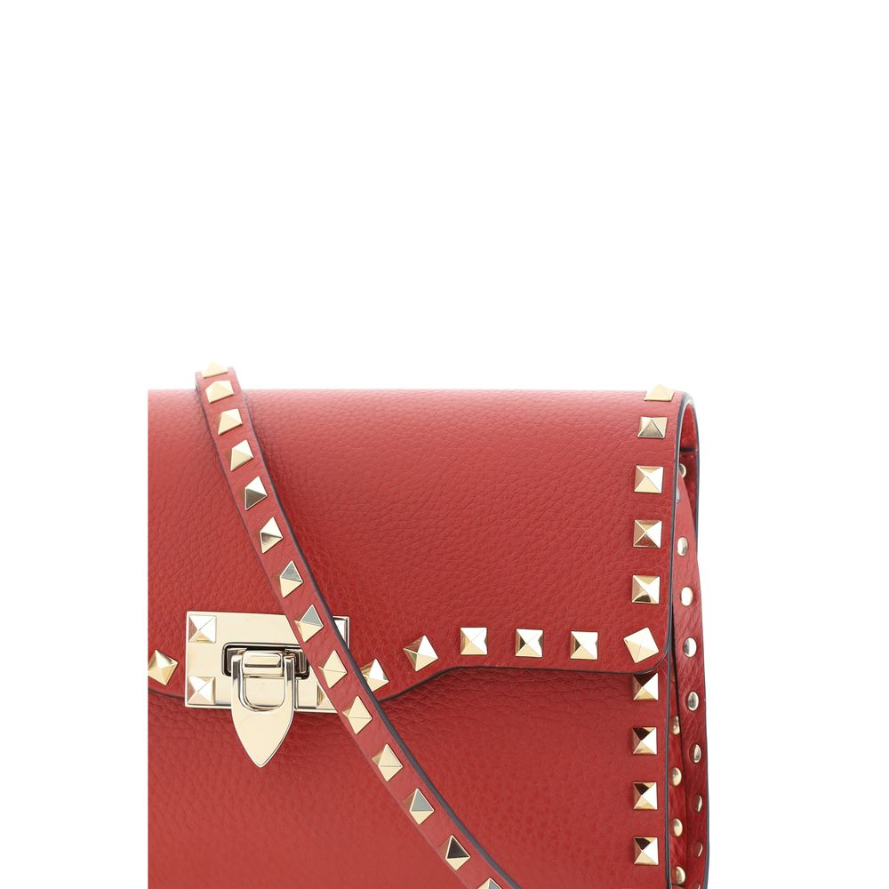 Small Shoulder Bag by Valentino Garavani for women in bos taurus calfskin leather multicolor features an effortlessly chic silhouette with a secure hook, ample , and versatile shoulder-strap & adjustable-strap for effortlessly chic everyday luxury.