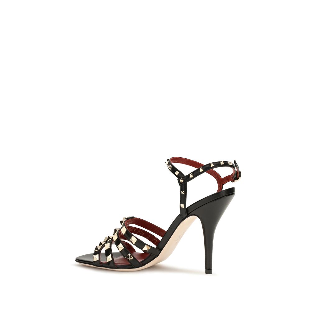 Stiletto Sandals by Valentino Garavani for women in goatskin leather black features an effortlessly chic silhouette from the Rockstud Women's Goatskin Leather Stiletto Sandals collection, showcasing a effortlessly chic stiletto and elegant .