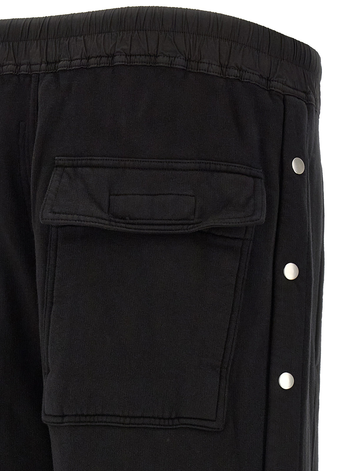 Trousers by DRKSHDW for men in horse leather & cotton black & silver presents a perennial silhouette, meticulously tailored with a flared & wide cut, long finish, and an elegant .