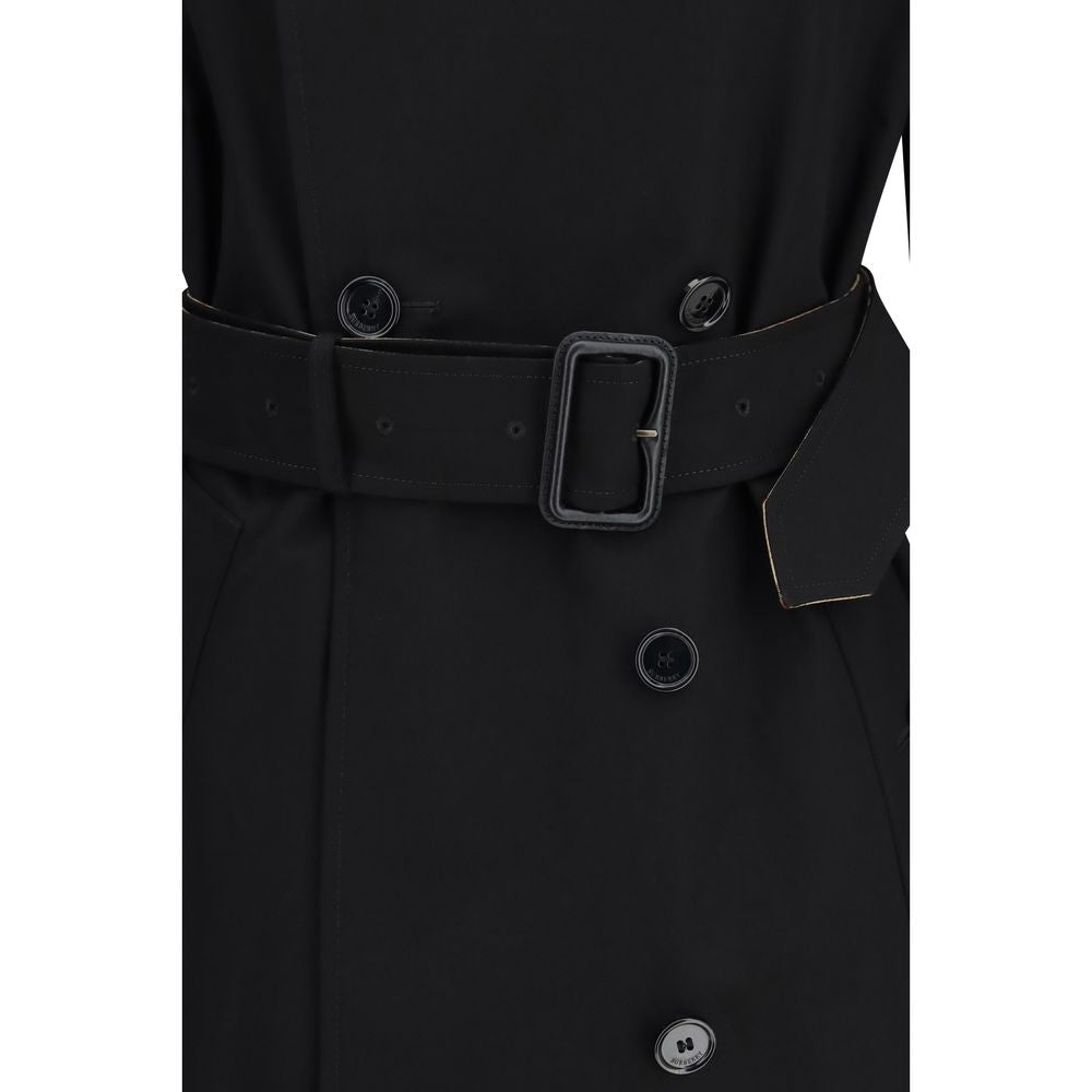 Trench Coat by Burberry for women in cotton beige & black presents an sculptural silhouette, artfully detailed with a sculptural and functional pockets for a truly sculptural finish.