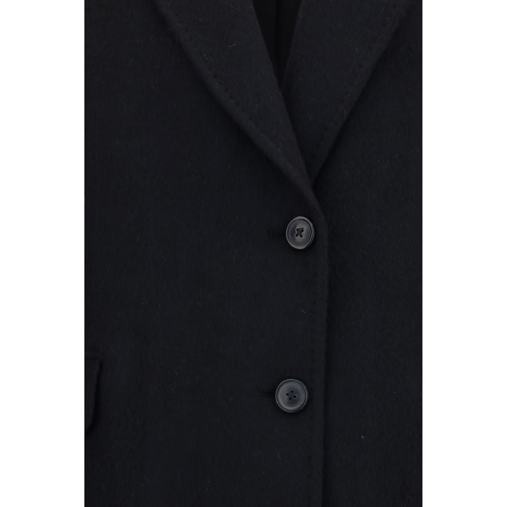 Overcoat by Our Legacy for women in mohair wool & polyamide black & horn showcases a architectural silhouette, artfully detailed with a distinctive and functional pockets for a architectural finish.
