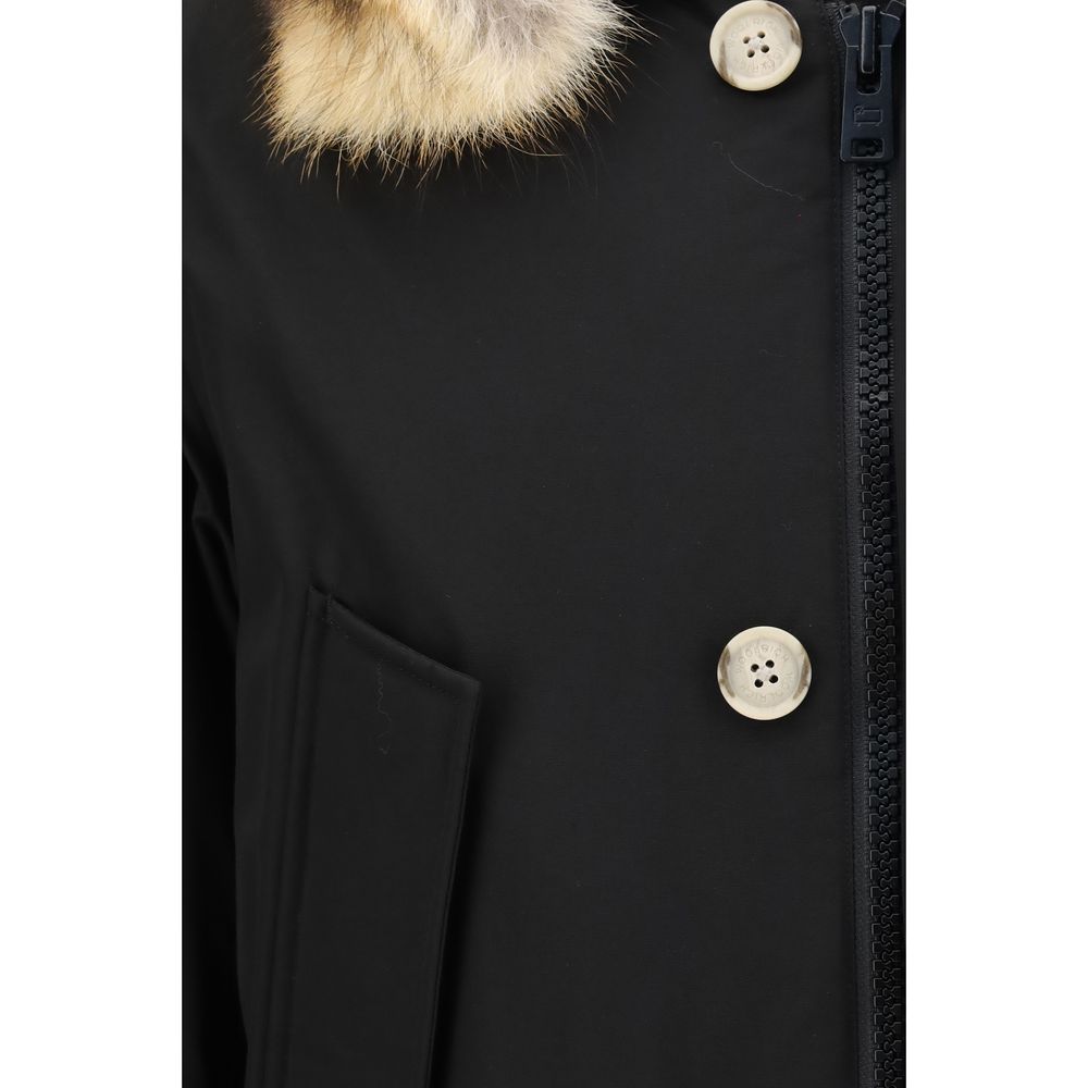 Hooded Parka by Woolrich for men in polyamide cotton duck-down & fur black presents a decadent silhouette, showcasing the decadent and functional pockets, hooded & insulated for a premium, weather-ready look.