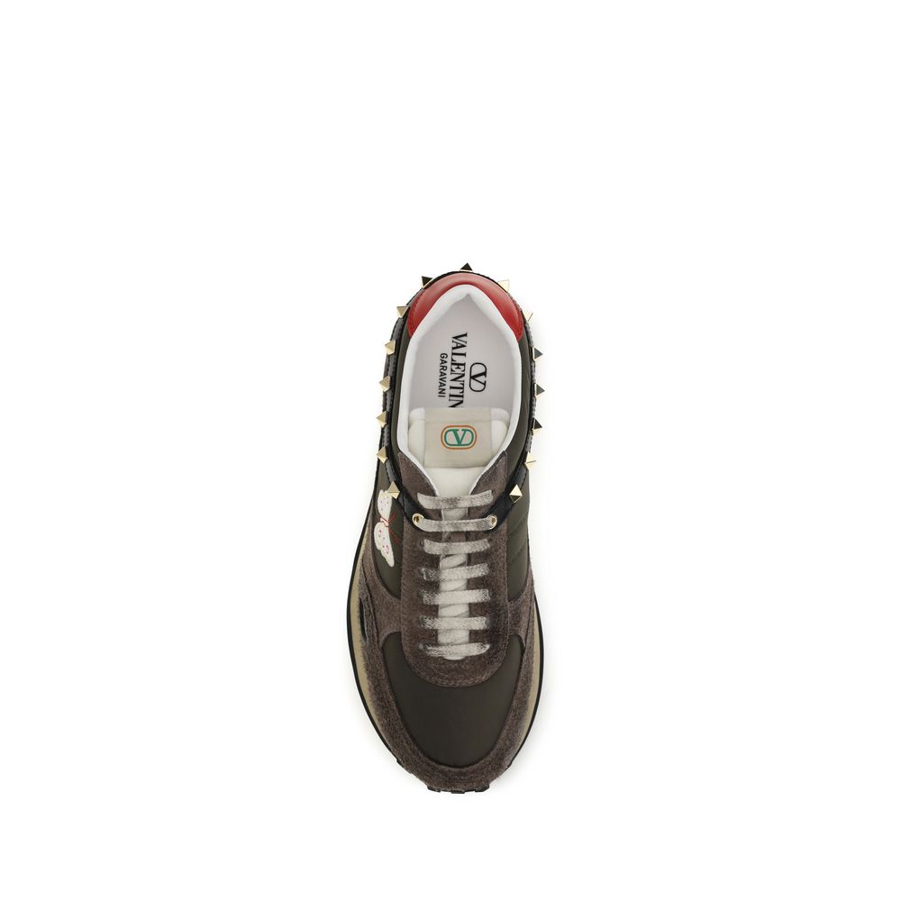 Sneakers by Valentino Garavani for men in bos taurus suede calf leather & nylon brown features an timeless silhouette from the Men's Low Top Bos Taurus Suede Calf Leather & Nylon Sneakers collection, showcasing a signature low-top style with an timeless finish.