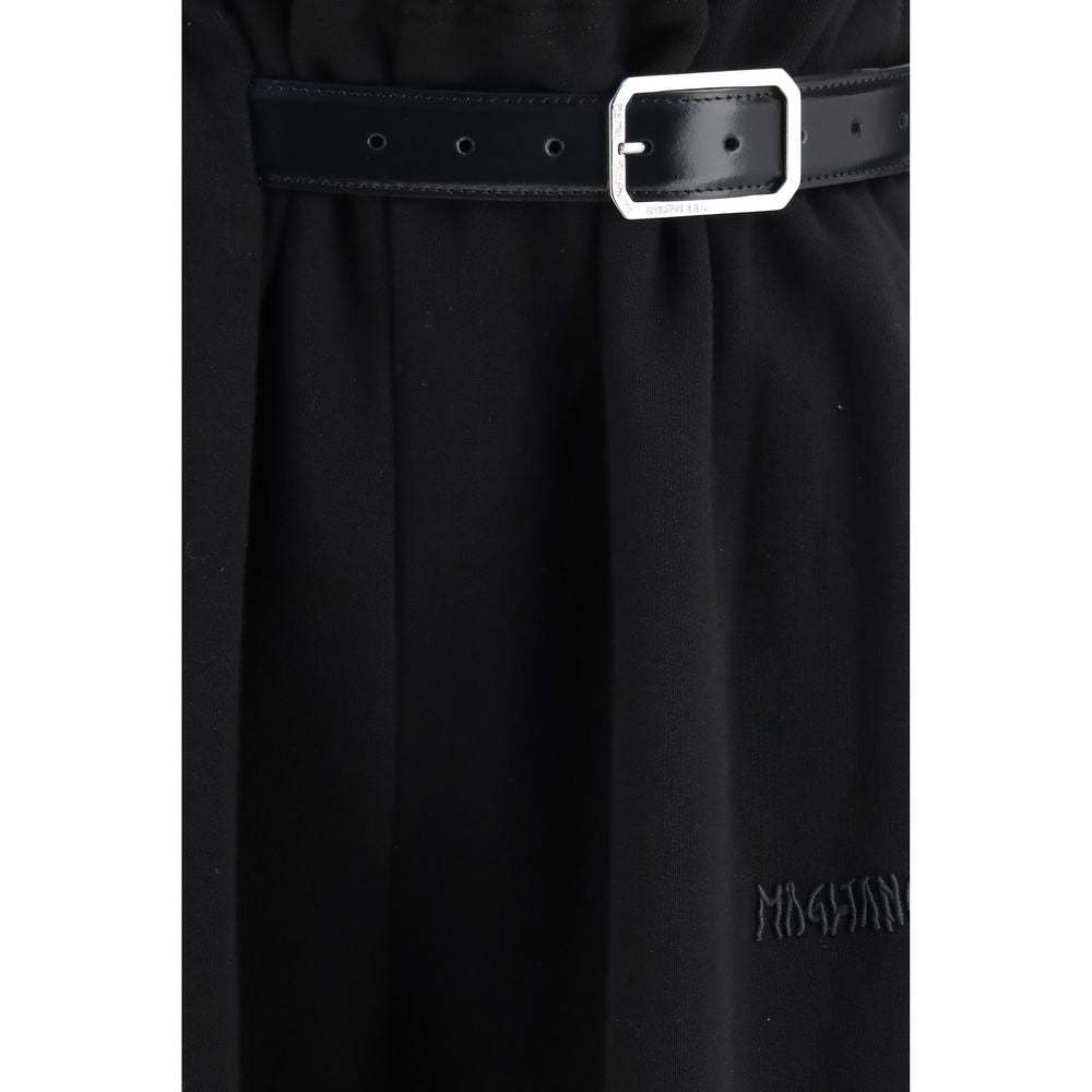 Casual Pants by Magliano for men in cotton black presents a tailored silhouette, showcasing a tailored straight-leg, relaxed-fit, regular-fit & wide and long cut with a refined high rise for a truly tailored aesthetic.