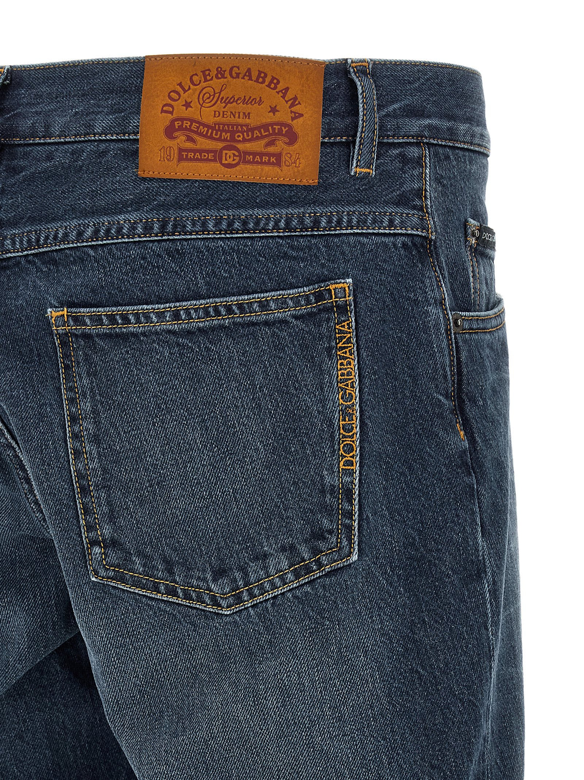 Jeans by Dolce & Gabbana for men in cotton denim blue & signature features a polished silhouette with a polished straight-leg, reaching a polished long and finished with a polished low rise.