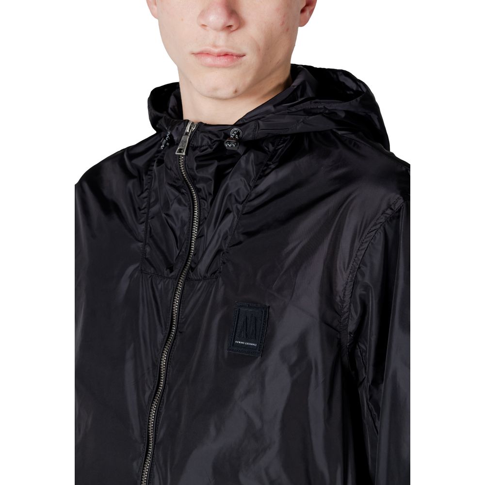 Hooded Rain Coat by Armani Exchange for men in polyamide black features a provocative silhouette, artfully integrating lightweight, pockets, hooded & water-resistant and a sophisticated for a provocative and weather-ready look.