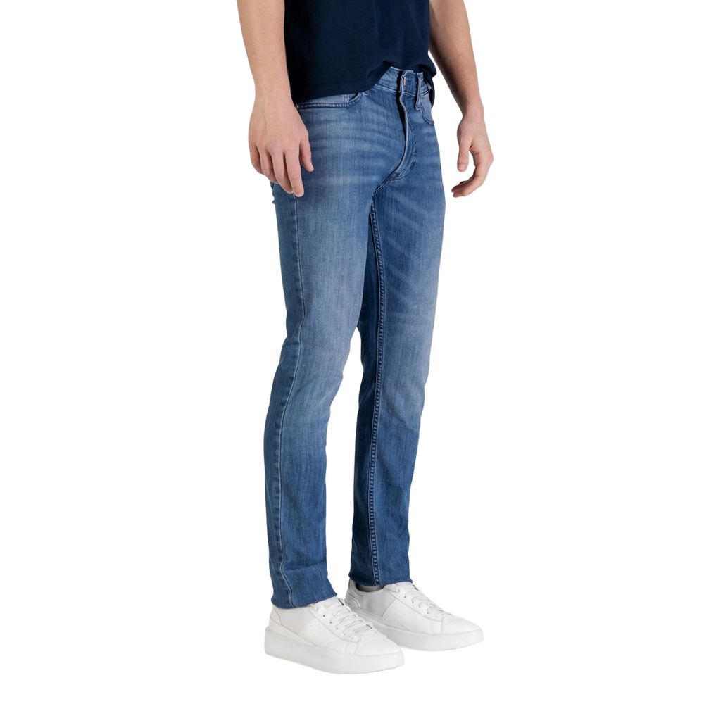 Jeans by Calvin Klein Jeans for men in stretch denim cotton blue & signature presents a refined pantology silhouette, artfully defined by a refined pantology skinny, long, and a sophisticated .