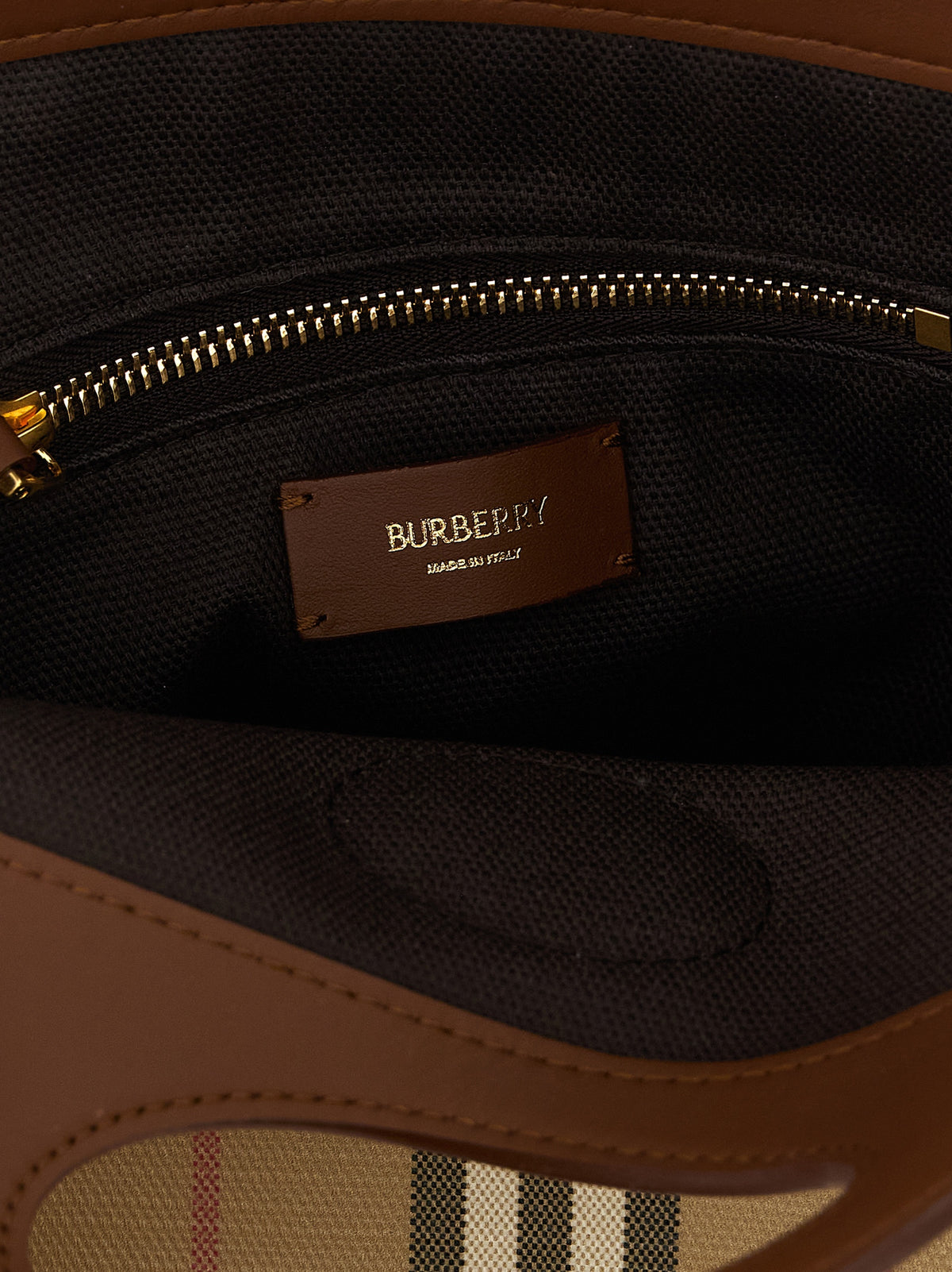 Mini Handbag by Burberry for women in cotton canvas & leather beige, gold & patterned features a signature silhouette, showcasing a secure and signature with versatile shoulder-strap, adjustable-strap & handle for a sophisticated look.