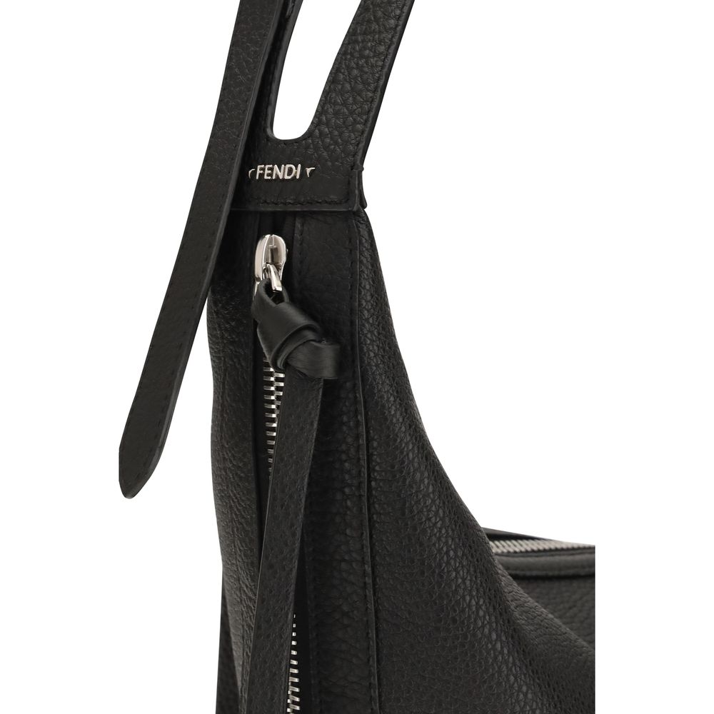 Small Shoulder Crescent Hobo Bag by Fendi for men in bos taurus calf leather & palladium black & palladium showcases a enviable silhouette, artfully detailed with a secure zipper, organized , and versatile shoulder-strap & adjustable-strap for a enviable look.