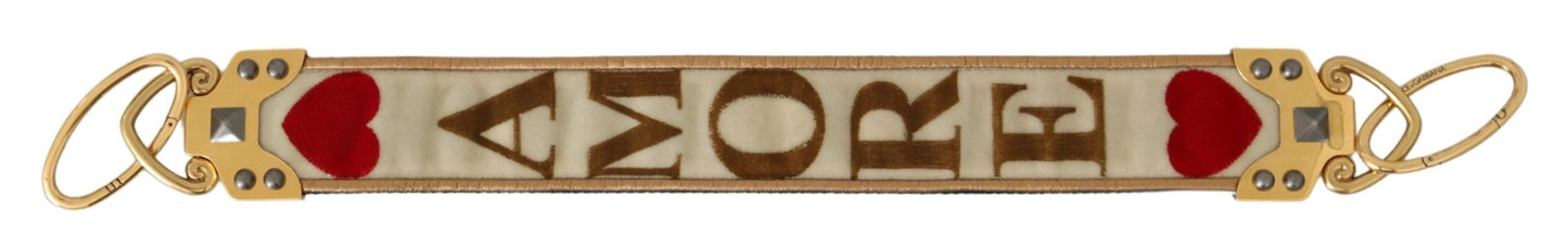 Shoulder Strap by Dolce & Gabbana for unisex in leather gold, white & print showcases a enviable design, perfect for elevating any ensemble as part of the Amore Leather Shoulder Strap collection.