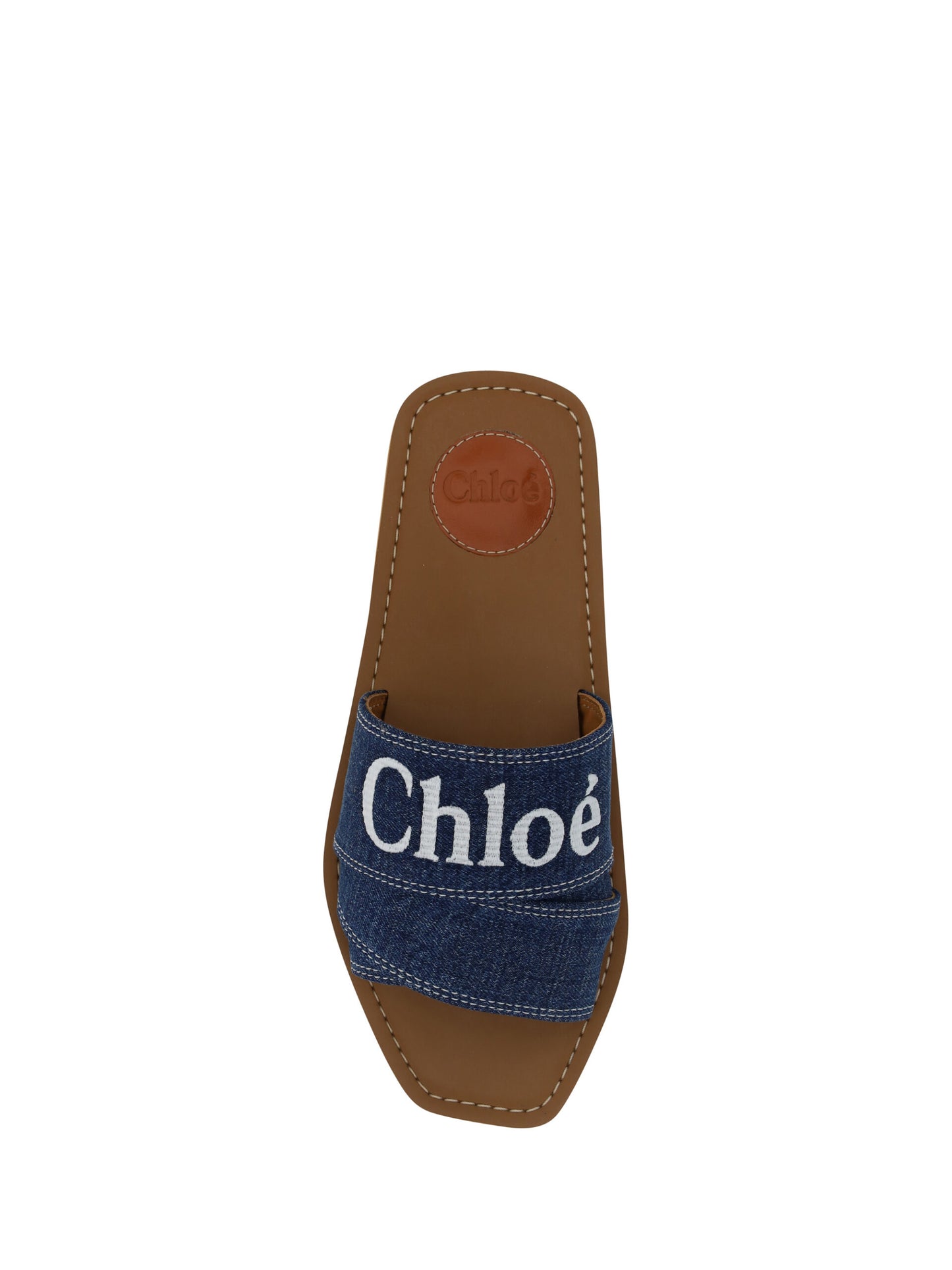Flat Slider Sandals by Chloé for women in plush cotton denim and blue & signature presents a captivating silhouette, showcasing the signature style of the Essence Grace Woody Women's Plush Cotton Denim Flat Slider Sandals with a captivating flat and captivating square toe style.