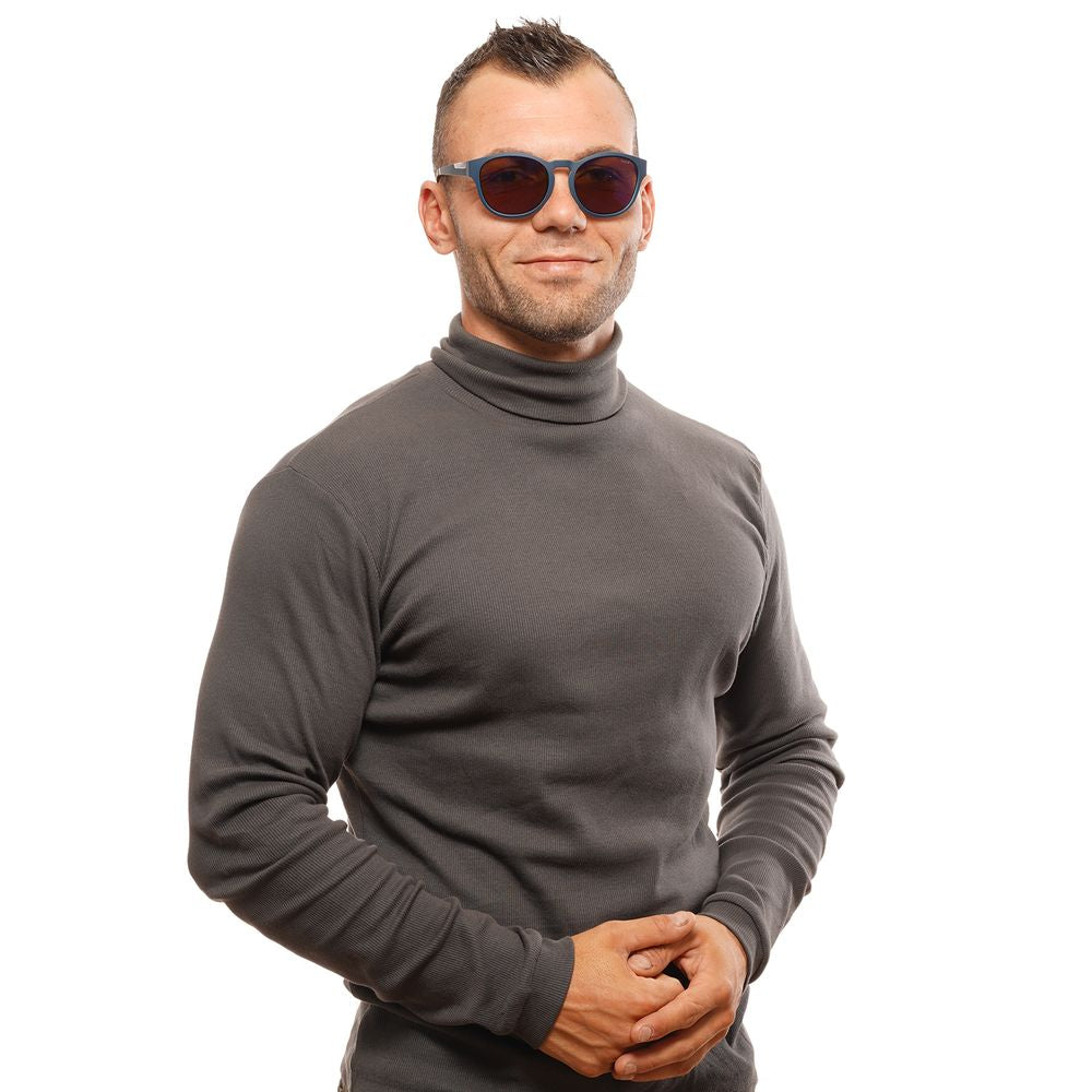 This Sunglasses by Bolle for unisex in blue presents a sumptuous silhouette, showcasing a sumptuous full-rim round frame design in blue coloured frame and high-performance mirrored category-3-dark-tint lens.