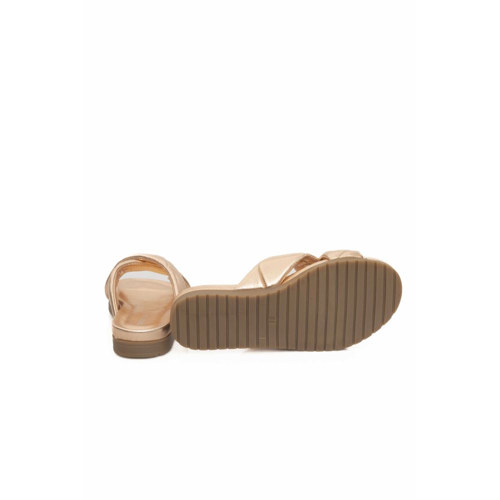 Flat Sandals by Cerruti 1881 for women in lambskin leather beige features an architectural silhouette, showcasing the architectural Women's Lambskin Leather Flat Sandals with a flat and .