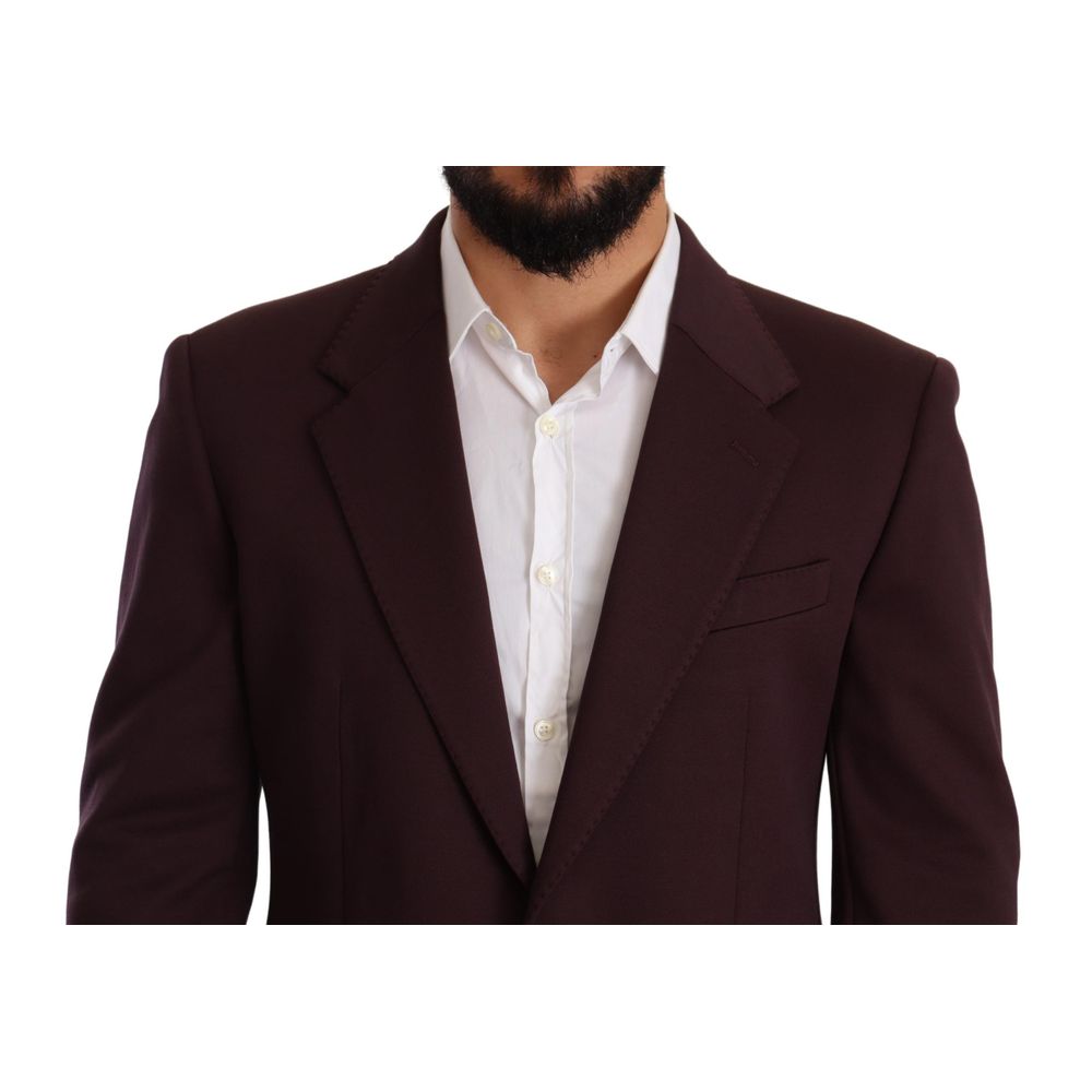 This Blazer by Dolce & Gabbana for men in stretch poly cotton indigo & purple presents a tailored silhouette, meticulously tailored with a tailored and distinctive for a tailored finish.