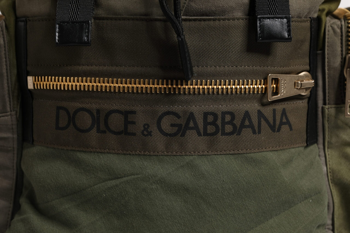 Large Drawstring Backpack by Dolce & Gabbana for men in calf leather & cotton military-green, camouflage, signature & patchwork features a stately Calf Leather Cotton Large Drawstring Backpack design, showcasing a secure drawstring, ample internal-pockets, and versatile backpack-strap for a stately finish.