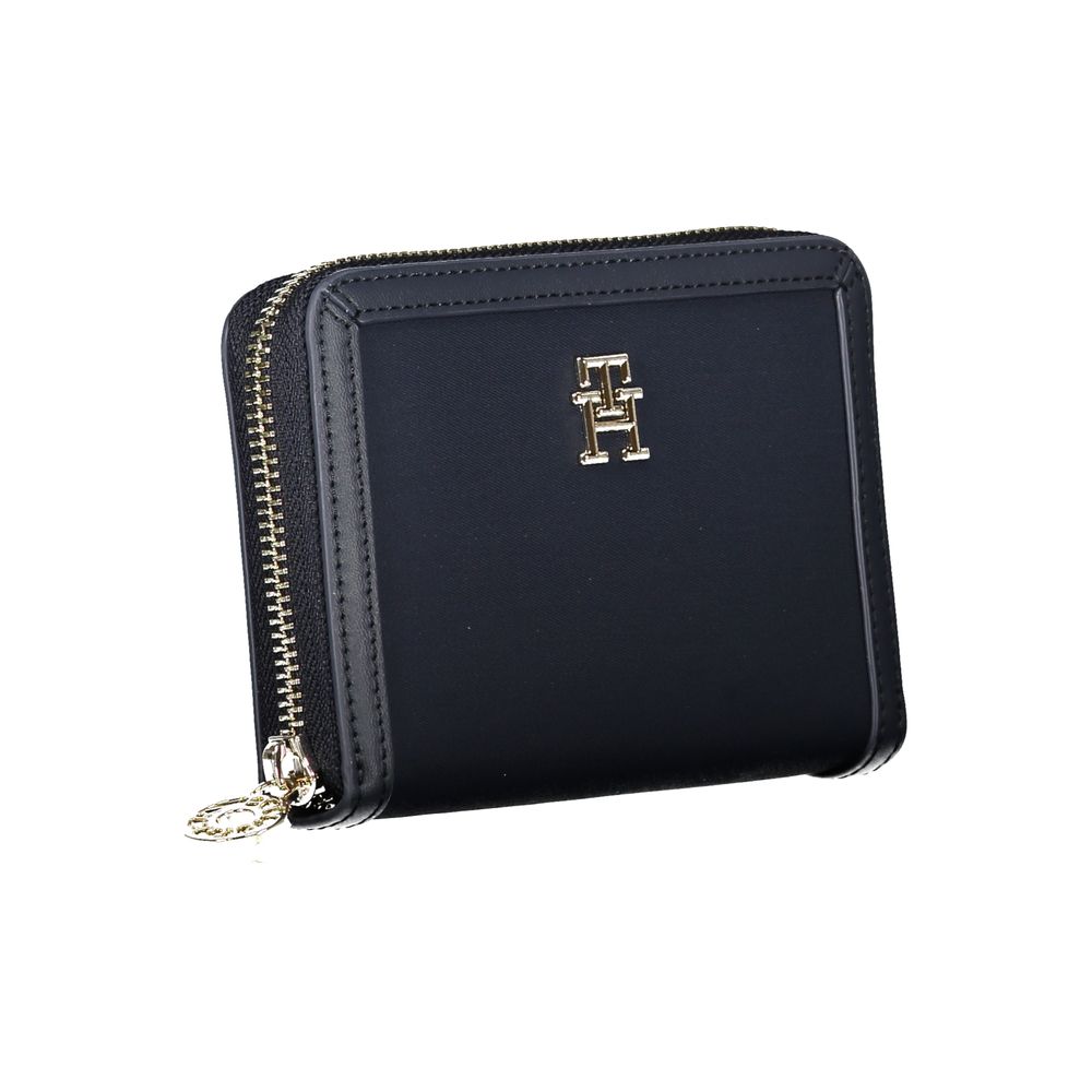 Wallet by Tommy Hilfiger for women in polyester & polyethylene blue presents a refined silhouette, artfully capturing the essence of the Polyester & Polyethylene Wallet design with sophisticated eco-friendly coin-purse for a refined look.