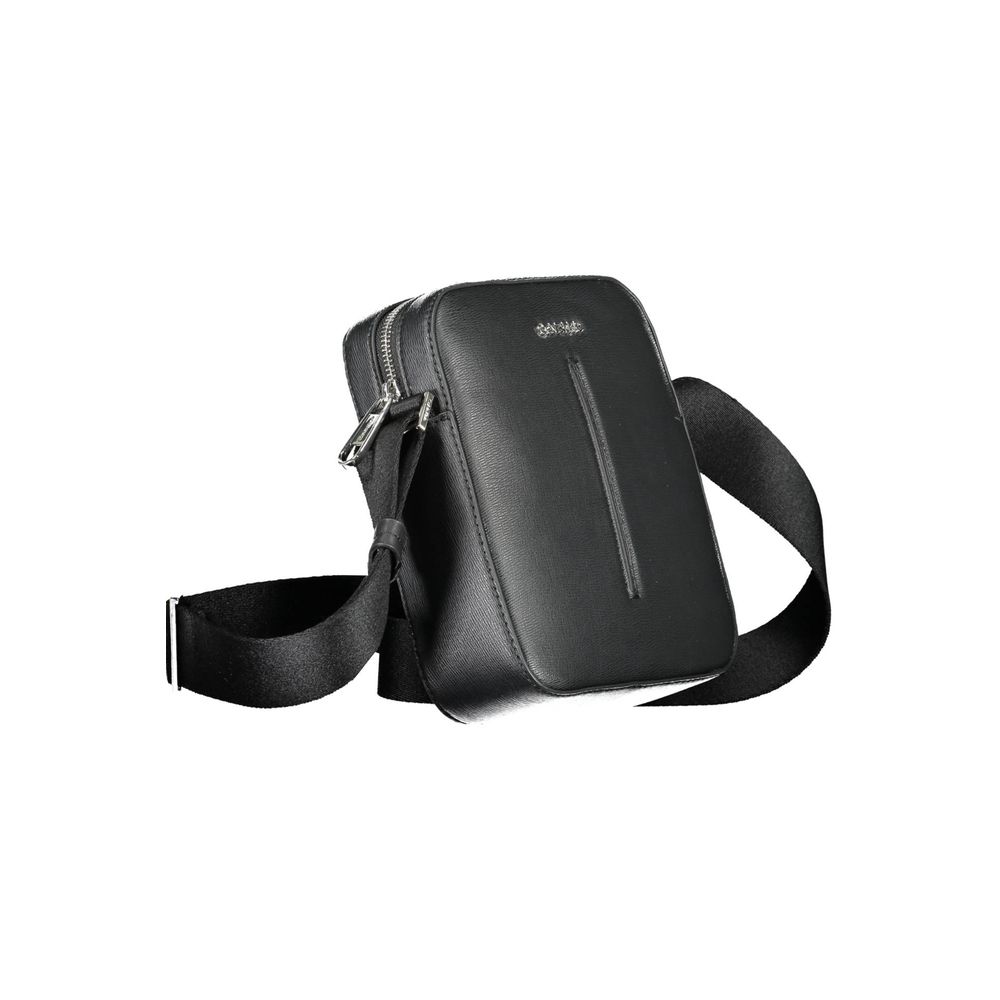 Shoulder Bag by Calvin Klein for men in polyester & polyethylene black features a statuesque silhouette, showcasing a secure zipper and statuesque internal-pockets with versatile shoulder-strap & adjustable-strap for a statuesque finish.