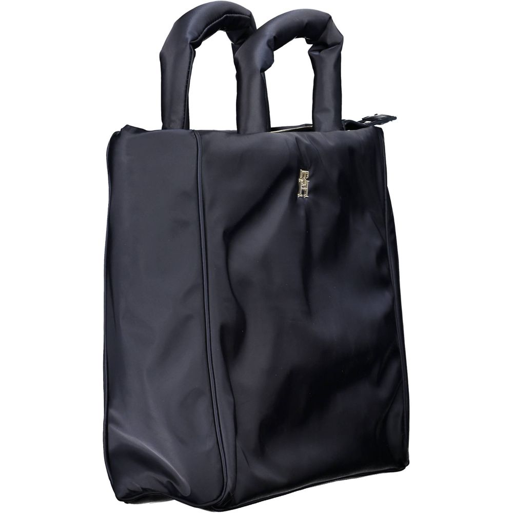Handbag by Tommy Hilfiger for women in polyester & polyethylene blue features a refined silhouette, showcasing a secure zipper, organized , and versatile shoulder-strap, adjustable-strap & handle for a refined finish.