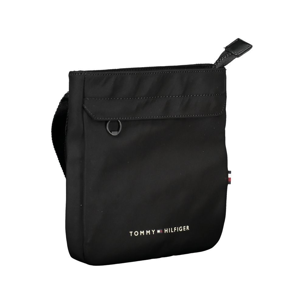 Shoulder Bag by Tommy Hilfiger for men in polyester black features a effortless chic silhouette with a secure zipper, ample external-pockets & internal-pockets, and versatile shoulder-strap & adjustable-strap for a effortless chic finish.