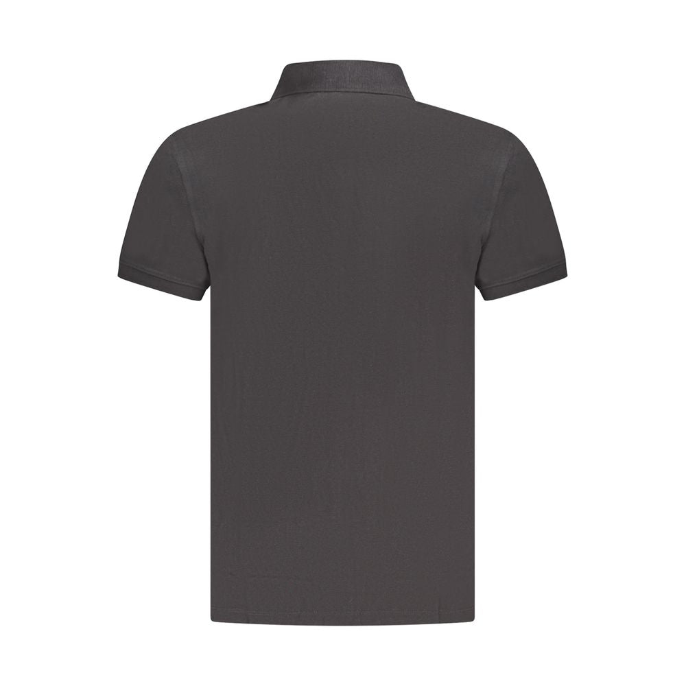 Polo Shirt by Timberland for men in organic cotton black & signature presents a distinguished silhouette, showcasing a sophisticated and distinguished for a truly distinguished finish.