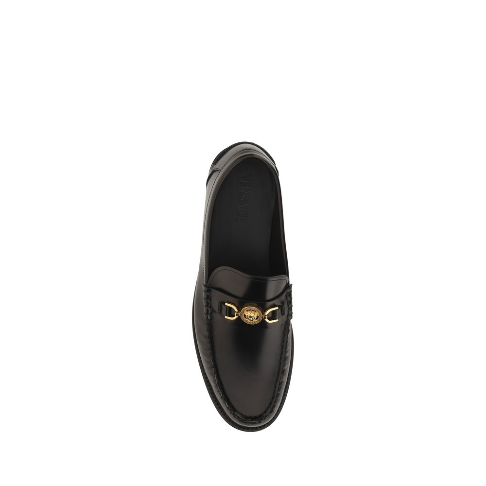 Loafer Shoes by Versace for men in bos taurus calf leather black features an ergonomic silhouette, perfectly showcasing Medusa Men's Bos Taurus Calf Leather Loafer Shoes with its distinct block-heel and elegant round toe style.