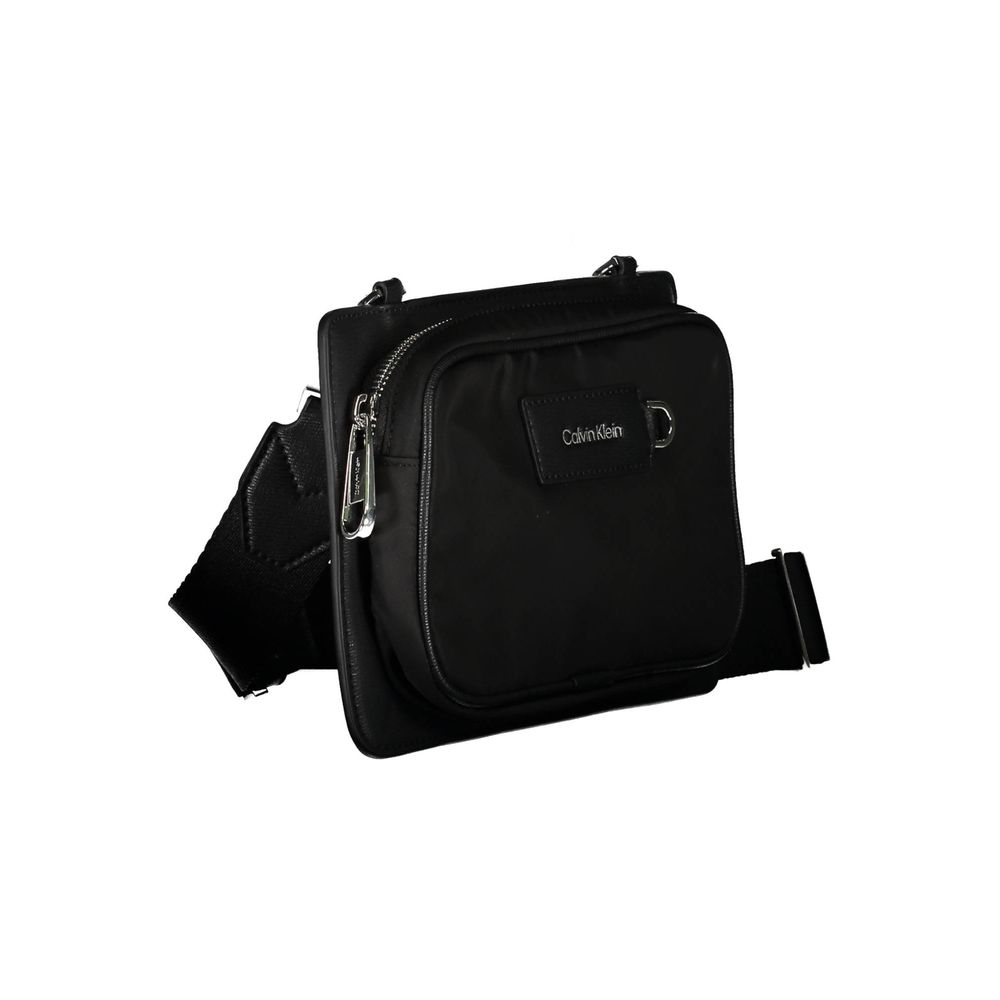 Shoulder Bag by Calvin Klein for men in polyester black presents a statuesque silhouette, showcasing a secure zipper and statuesque external-pockets with versatile shoulder-strap & adjustable-strap for a sophisticated look.