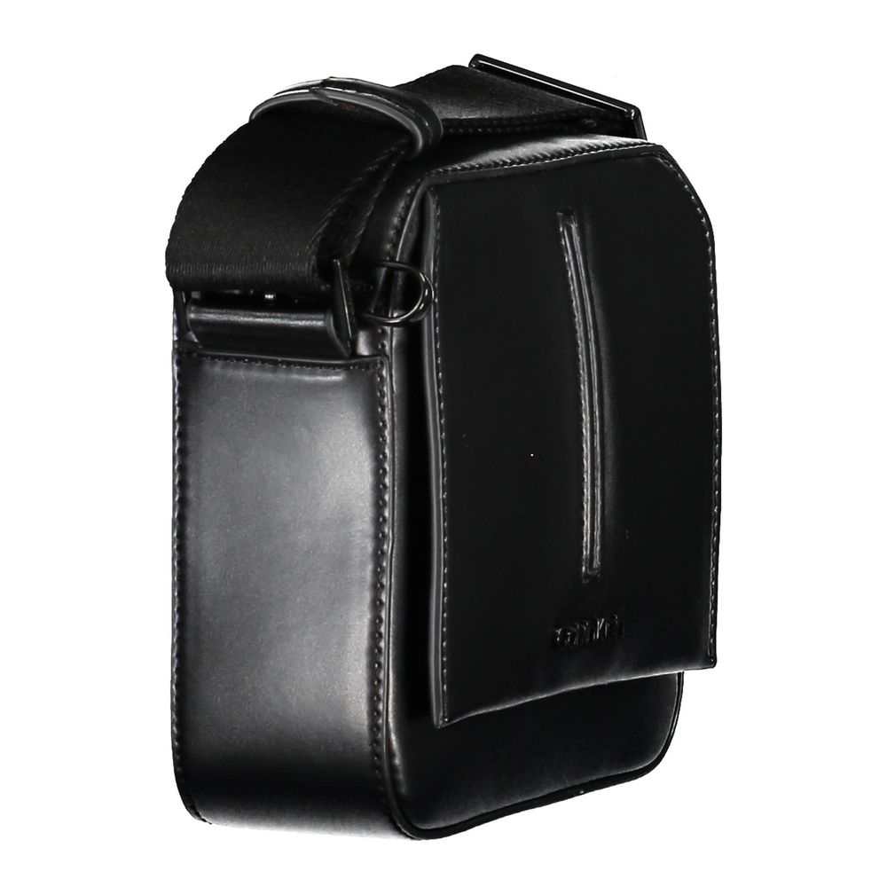 Shoulder Bag by Calvin Klein for men in polyester black showcases a statuesque silhouette, artfully detailed with a secure snap & zipper, organized external-pockets, and versatile shoulder-strap & adjustable-strap for a statuesque look.