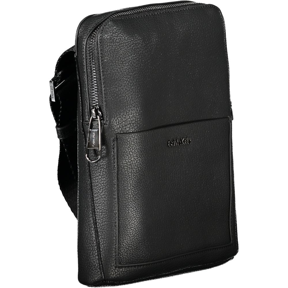 Shoulder Bag by Calvin Klein for men in polyester black showcases a statuesque silhouette, artfully detailed with a secure zipper, organized external-pockets & internal-pockets, and versatile shoulder-strap & adjustable-strap for a statuesque look.