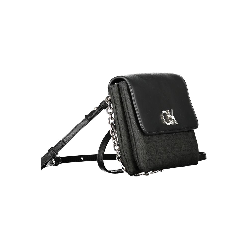 Crossbody Convertible Handbag by Calvin Klein for women in polyester black features a polished silhouette with a secure , ample built-in-compartments & cardholder, and polished crossbody-strap, shoulder-strap, adjustable-strap & handle for a sophisticated look.