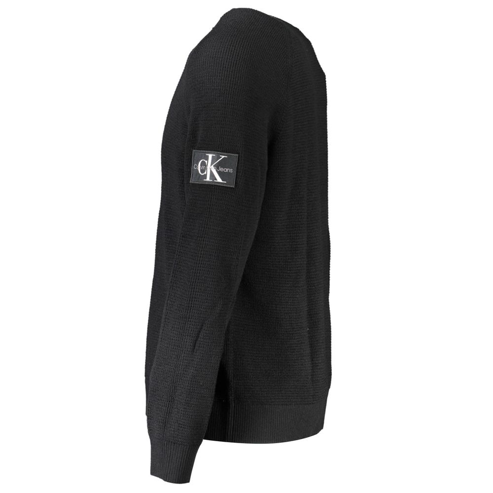 This Sweater by Calvin Klein for men in wool black presents a understated silhouette, featuring a sophisticated and for a understated finish.