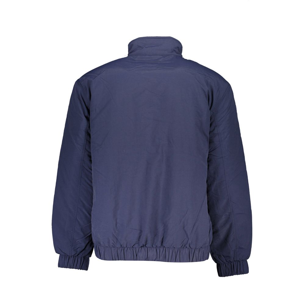Jacket by Tommy Hilfiger for men in nylon blue showcases a contemporary silhouette, detailed with a contemporary and premium pockets for a sophisticated finish.