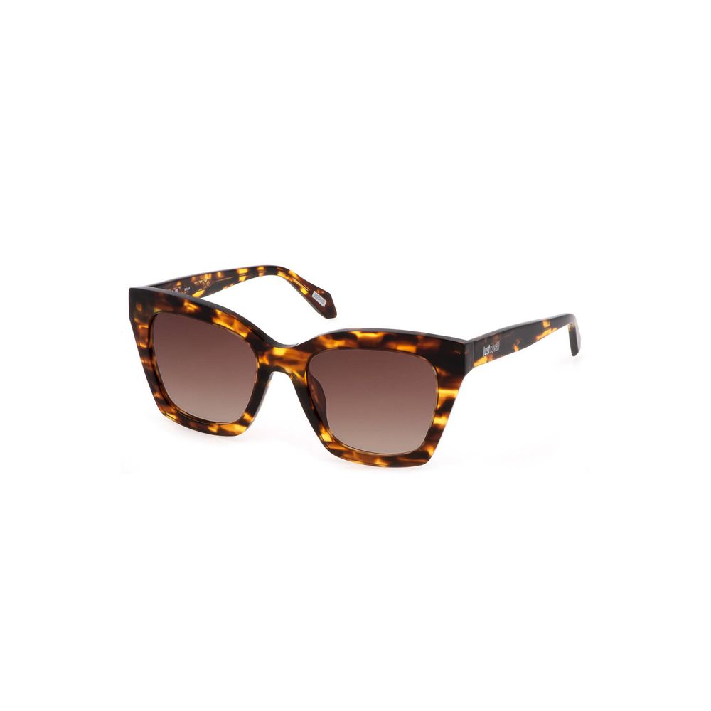 This Sunglasses by Just Cavalli for women in leather brown presents a sumptuous silhouette, showcasing a sumptuous square frame design in brown coloured frame and high-performance .