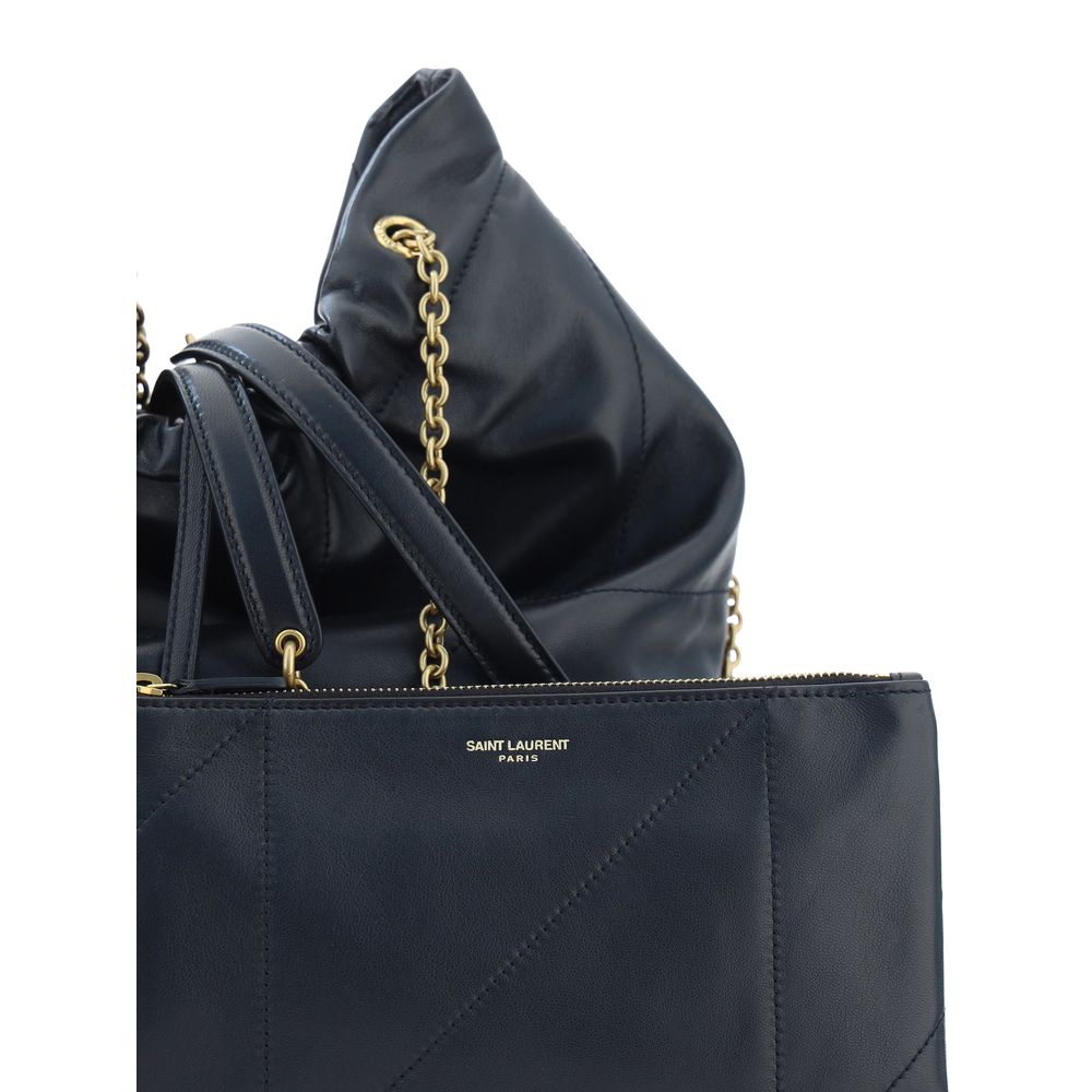 Shoulder Bucket Bag by Saint Laurent for women in lambskin leather black, signature & patchwork features a enviable silhouette, showcasing a secure drawstring, ample , and enviable shoulder-strap & adjustable-strap for a enviable finish.
