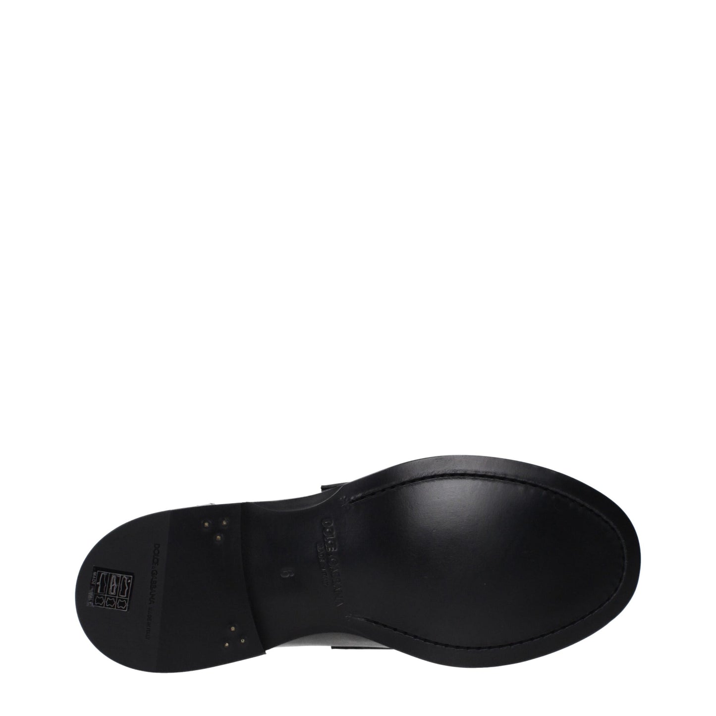 Flat Loafer Shoes by Dolce & Gabbana for men in leather black features an effortless chic silhouette, showcasing the Men's Leather Flat Loafer Shoes design with an effortless chic flat and a round toe style for a effortless chic look.