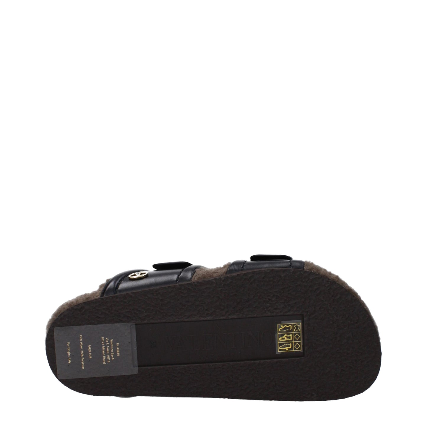 Flat Clogs Slippers by Valentino Garavani for women in leather & rubber black presents a sumptuous silhouette, perfectly capturing the sumptuous essence of Women's Leather & Rubber Flat Clogs Slippers with its signature open toe style and flat.