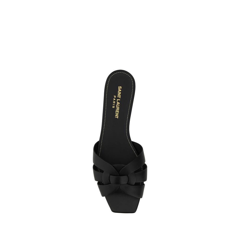 Sandals by Saint Laurent for women in bos taurus calfskin leather and black presents a captivating silhouette, showcasing the signature style of the Women's Bos Taurus Calfskin Leather Sandals with a captivating block-heel and captivating square toe style.