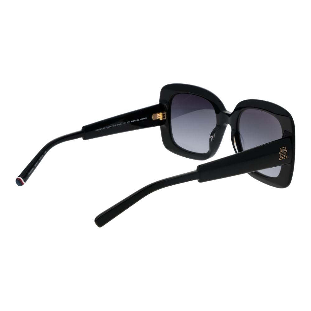 Sunglasses by Tommy Hilfiger for women in acetate and black presents a sumptuous silhouette, featuring black coloured frame and full-rim square frame design with gradient category-3-dark-tint lens for a sumptuous look.