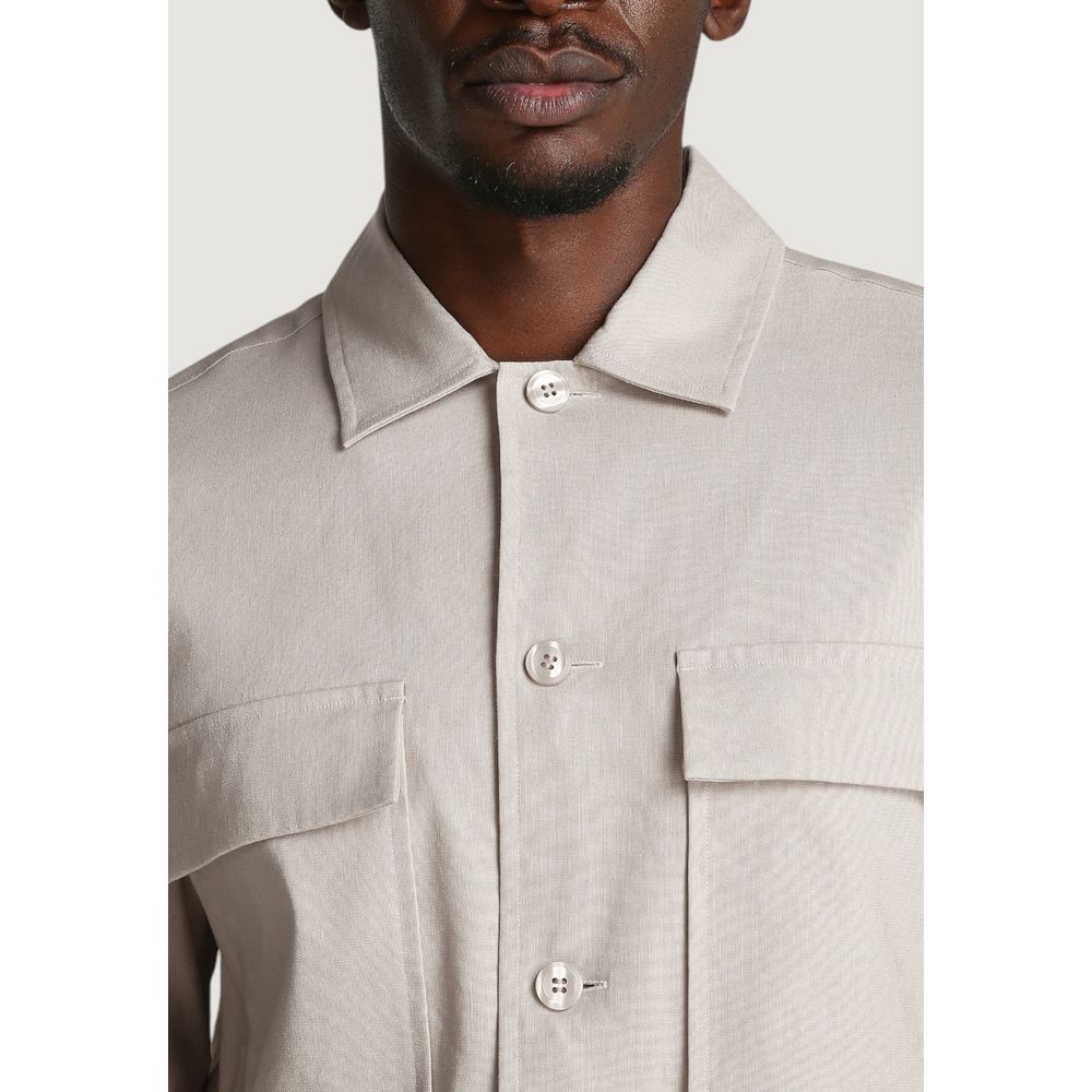 Overcoat by Calvin Klein for men in stretch linen & lyocell beige presents a luxurious silhouette, showcasing a luxurious and sophisticated breathable-design, lightweight & pockets for a premium, luxurious look.