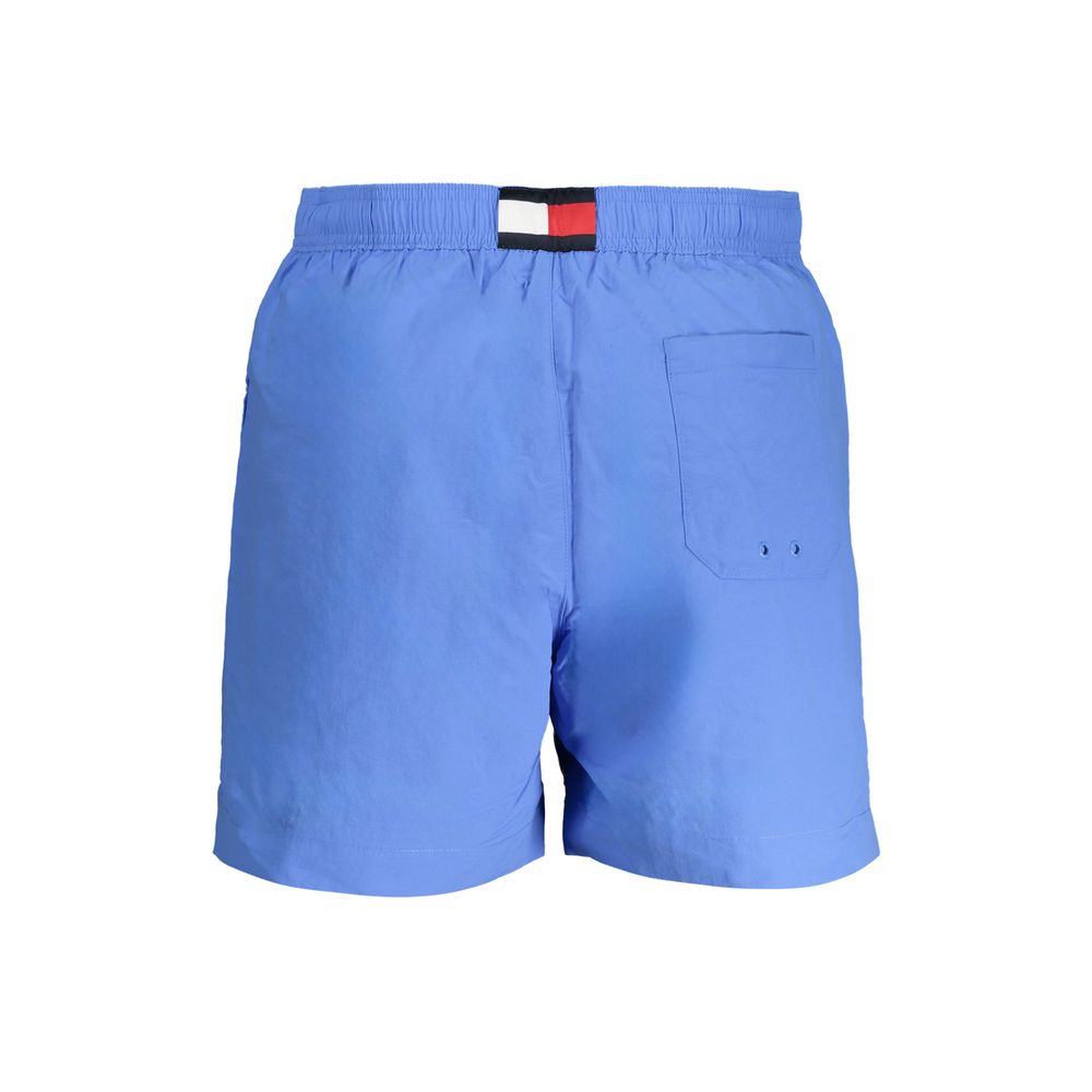 Swim Shorts by Tommy Hilfiger for men in nylon blue presents a sculptural silhouette, showcasing the sculptural Men's Nylon Swim Shorts design with a refined cut for a premium, sophisticated look.